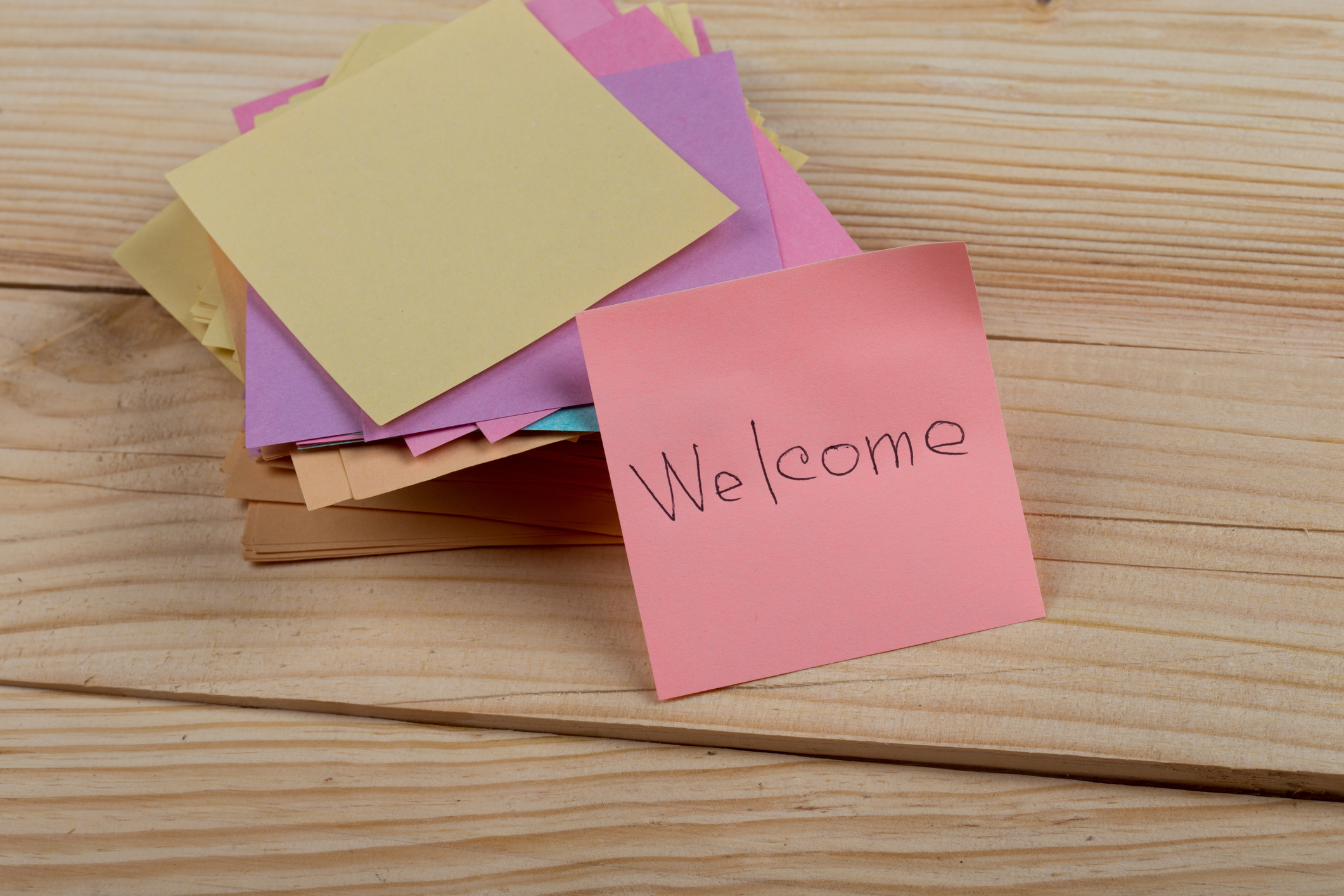 dreamstime_m_144001488.jpg (greeting concept - The text "Welcome" written...
