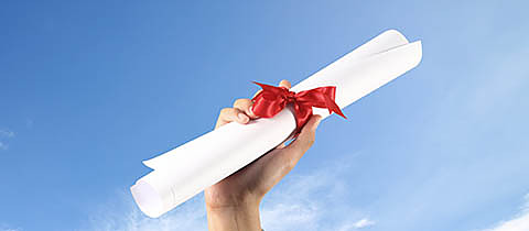 Diploma with a red ribbon